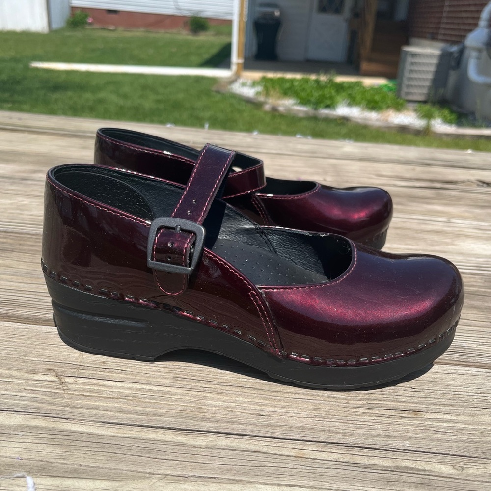 Burgundy patent leather Mary-Jane Dansko shoes in a size 37 EU, 6.5 US